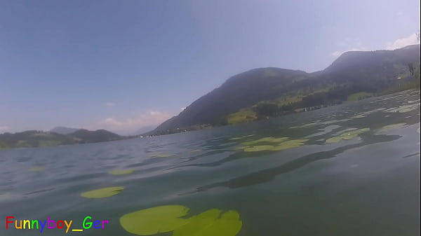 Image Underwater fun: Gay guy jerks off his foreskin penis in a lake in the mountains. (S)