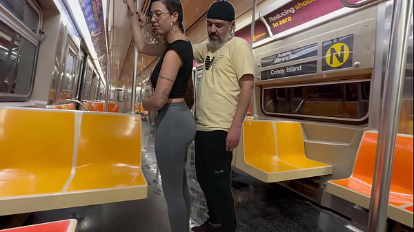 Image Student girl gets cum on New York subway train.
