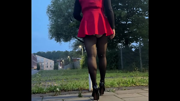 Image Sissy teasing on balcony
