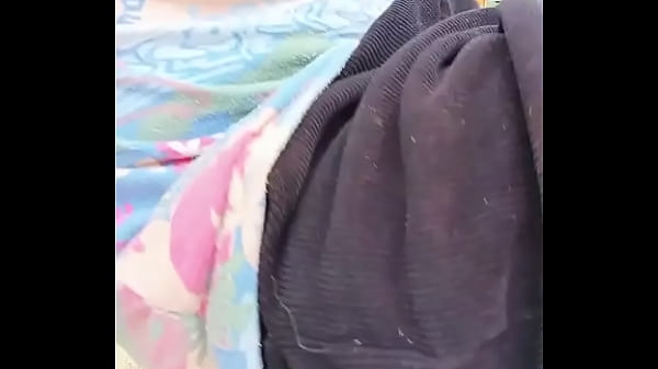 Image Horny bottom fingering his asshole in the forest