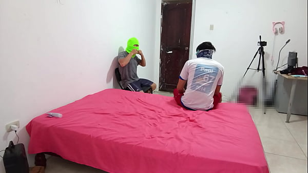 Image The Indian woman flirts with two men while filming her porn scene and fucks with a skin-colored dildo.