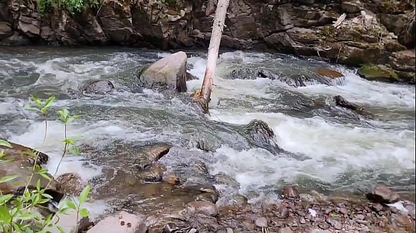 Image Backshots by the river: outdoor quickie