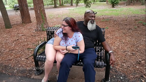 Image Nerdy Milf strokes and suck blk dick in the Park