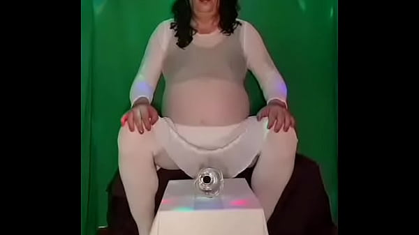 Image crossdressing sissy enjoying his own pee party by swallowing his own while you all watch with the two voting down wankers