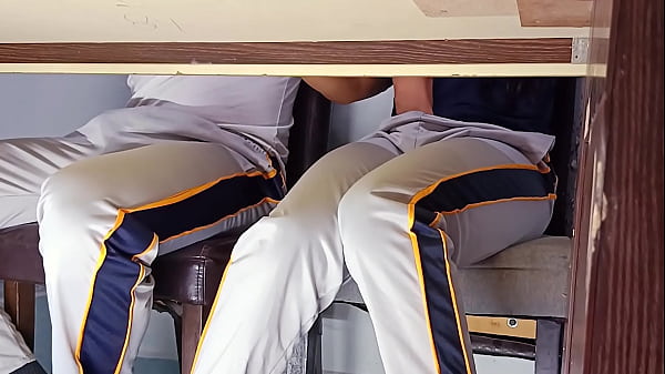 Image Forbidden Passion: Hot Student Teasing and Touching Under the Table