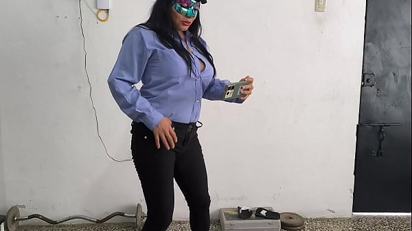 Image The female police officer shows off her sensual body after work.