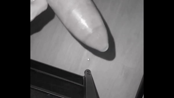 Image Jerking off a big dick in a condom