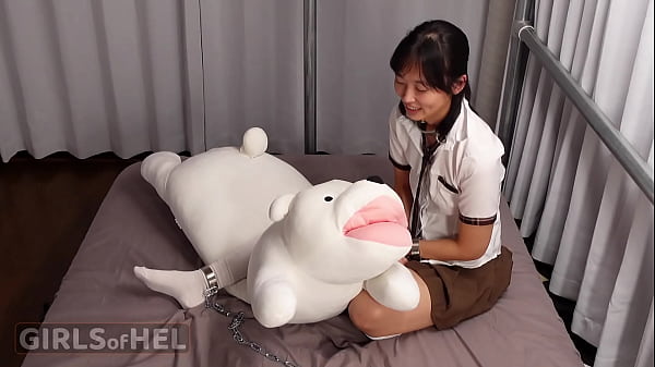 Image Chained up cutie makes herself cum with toys