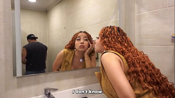 Image Distracted busty redhead ends up in the men's bathroom and can't resist seeing a big dick