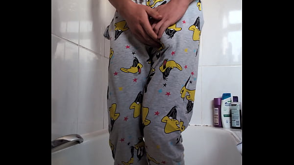 Image Holding and wetting pjs 18 yr old lad