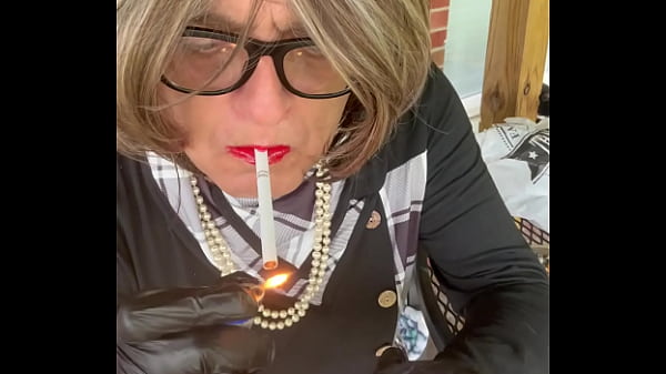 Image CD Nikki smokes with Hello Kitty osntied