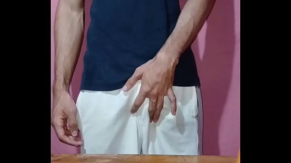 Image Young muscular guy with hard cock strips and jerks off