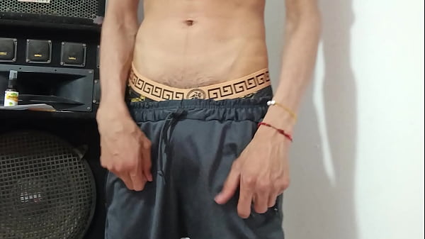 Image young man with a big uncut cock masturbating