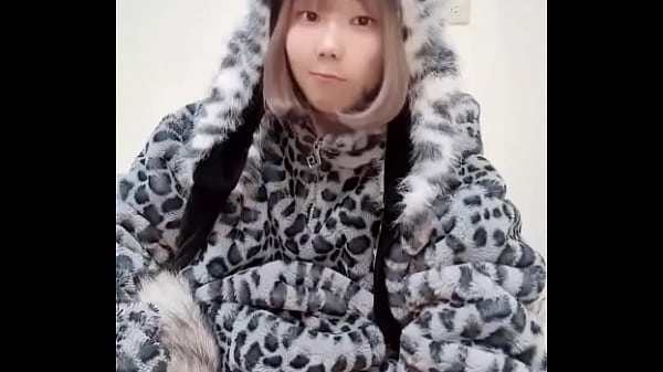 Image Wrapped in a fluffy snow leopard coat, I play with myself and let the sex machine push me over the edge