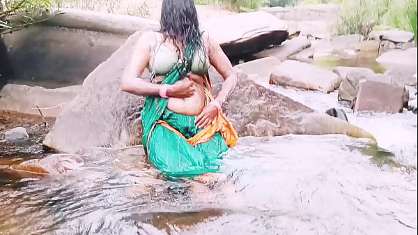 Image Villege aunty outdoor water fall bathing. Telugu dirty talks.