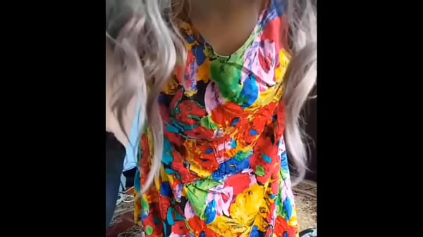 Image Stunning shemale with flushed cheeks sipping iced coffee