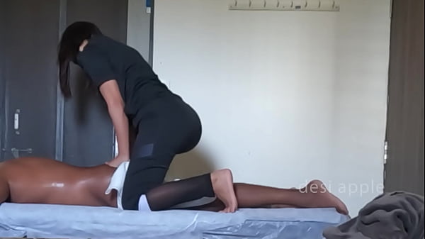 Image Massage girl enjoying herself while doing massage on customer