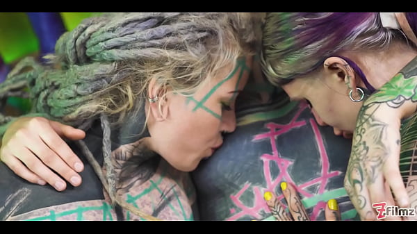 Image Tattooed girl gets her ass filled with cum, compliment of goth lesbians