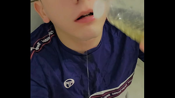 Image 18 year old boy plays with his pee