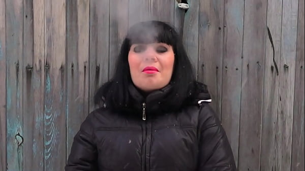 Image A MILF smokes and cums. Amateur fetish masturbation of a hairy pussy.