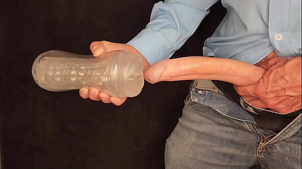 Image Filling a clear fleshlight with monster dick