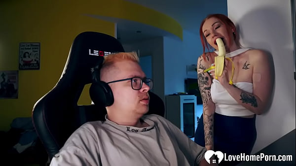 Image Distracting his gaming with a good blowjob