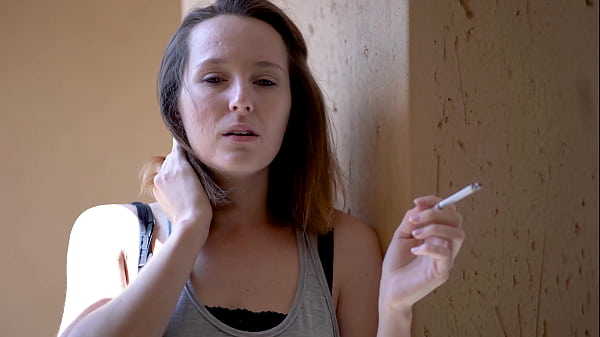 Image Brunette Smoking Tease with Intense Eye Contact