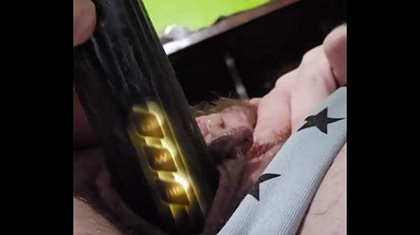 Image Horny wife uses a vibrator to make a mess while husband is at work.