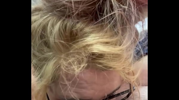 Image Streetwalker with glasses deepthroats a cock then sucks off every drop of cum after a man cums in her mouth