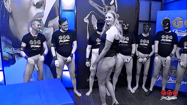 Image GGG - TALL BLONDE SURROUNDED BY MANY LOADED AND HARD COCKS