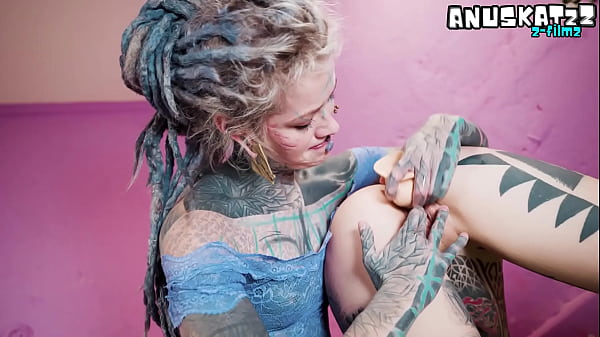 Image Tattooed Lovers Share a Wild Strap-On