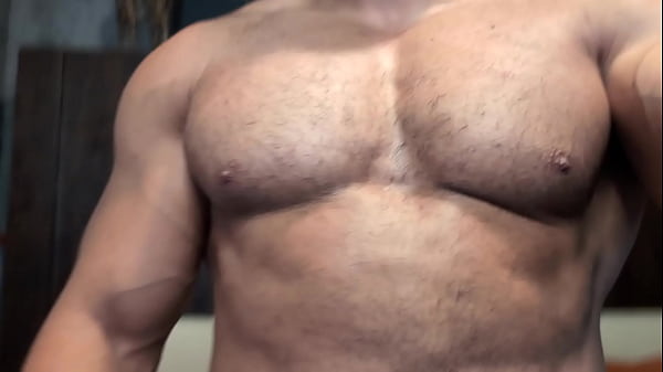 Image Massive Bodybuilder Displays Impressive Muscular Physique with Flexing and Posing