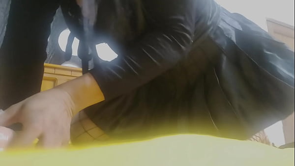 Image A young woman makes a sexy amateur homemade video on Halloween.