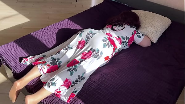 Image The stepmom lay down on the bed but the stepson disturbed her