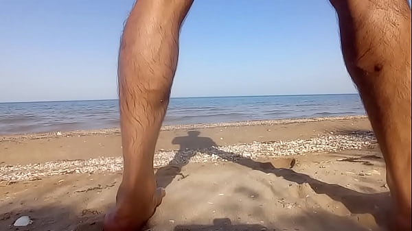 Image A mulatto fucks herself with a big dildo of the beach. Part6