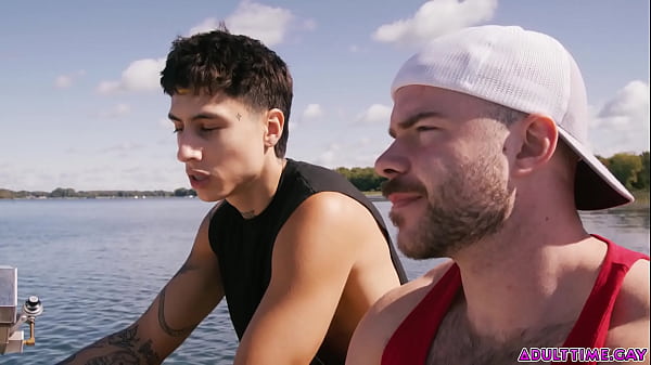 Image Angel Elias and Marcus McNeil masturbating and fucking each other on a boat. Out in the open ocean there is no one who can see what how these naughty guys have sex!