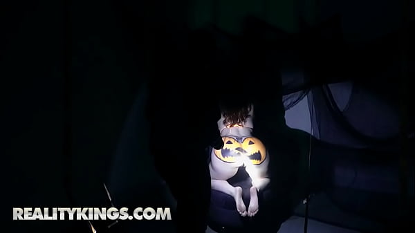 Image REALITY KINGS - Risky Finds Himself Cornered On The Couch For A Halloween Threesome With Anna Claire Clouds & Sisi Rose