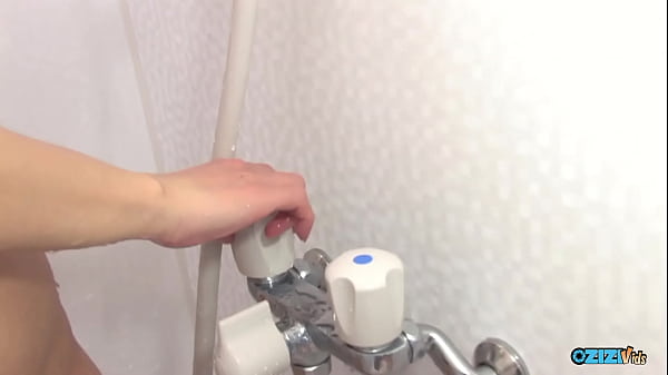 Image She was having a shower and a fingering session all at once by this dude