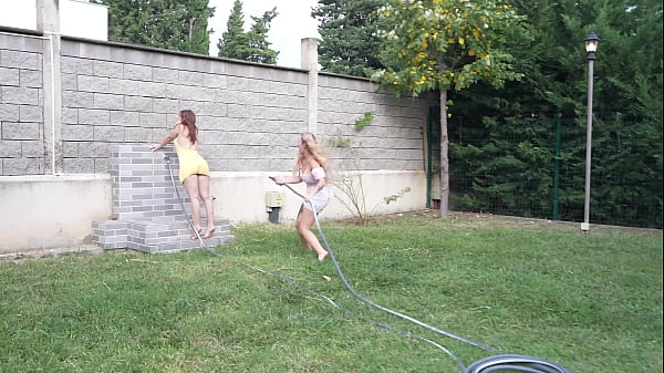 Image A daring gardener pesters the daughters of the house owner.