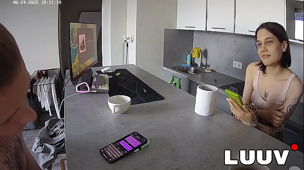 Image LUUV. Real couple Kareflore and Abbadon engage in a casual, real conversation in the kitchen for their reality show