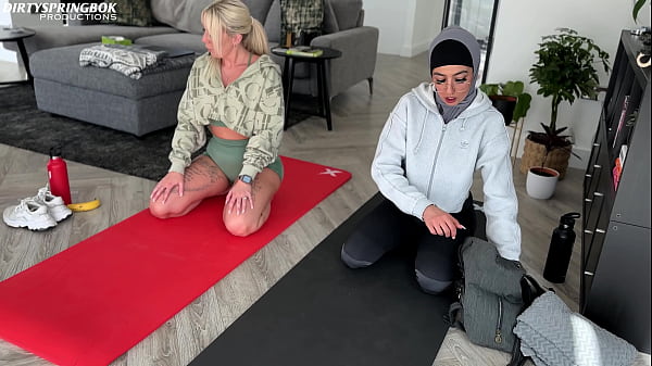 Image Emily shows Muslim Aaliyah Yasin how to relax after gym