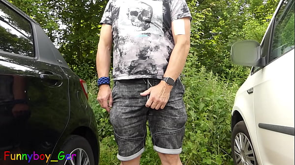 Image In a parking lot between cars I jerk off, put a vibrator on my big cock and show my asshole (S)