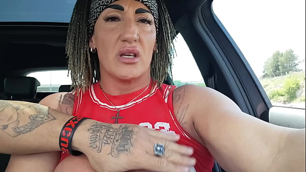 Image I take out my tits and fuck myself in the car so they can see me
