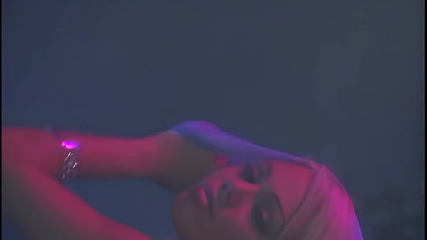 Image A strap-on dildo makes an appearance and the ladies fuck it hard and fast before it's all through