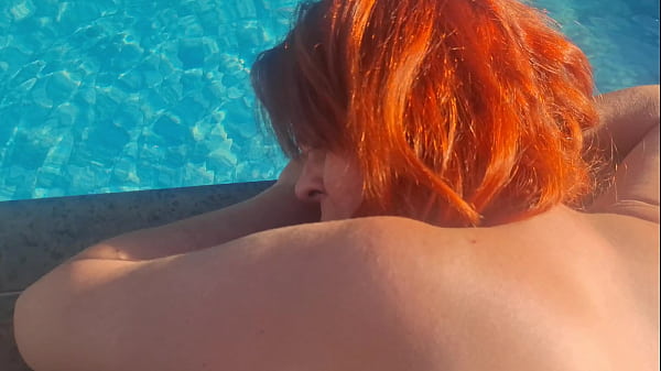 Image Sex with a redhead in the pool.