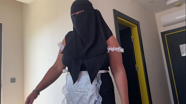 Image A maid in a hijab allowed herself to be fucked in a hotel room for money.