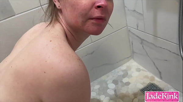 Image Peeing on slutty girlfriend in bathroom and made to lick piss from floor