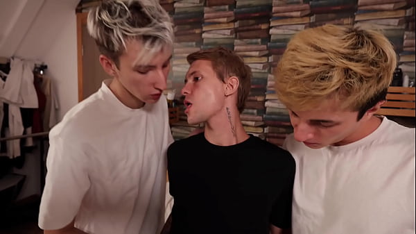 Image A cute twink gets fucked in the mouth and ass by big guys