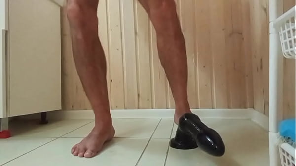 Image A huge dildo penetrates deep into me and I start to pee.