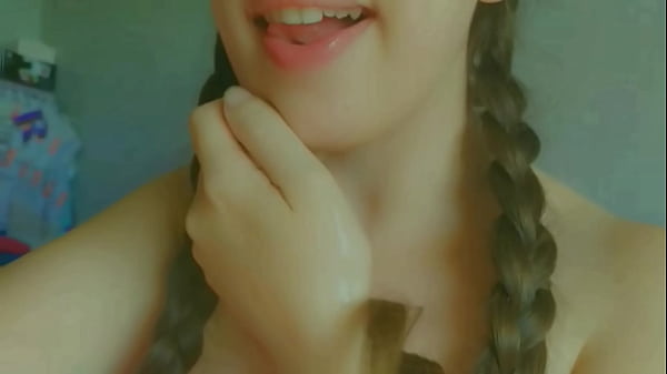 Image horny and naughty student showing her tongue , mouth watering and masturbation